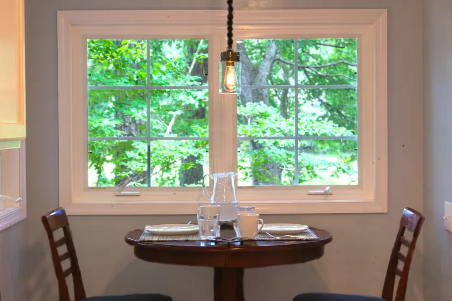 Breakfast nook overlooking the trees at Casa Blue Heron